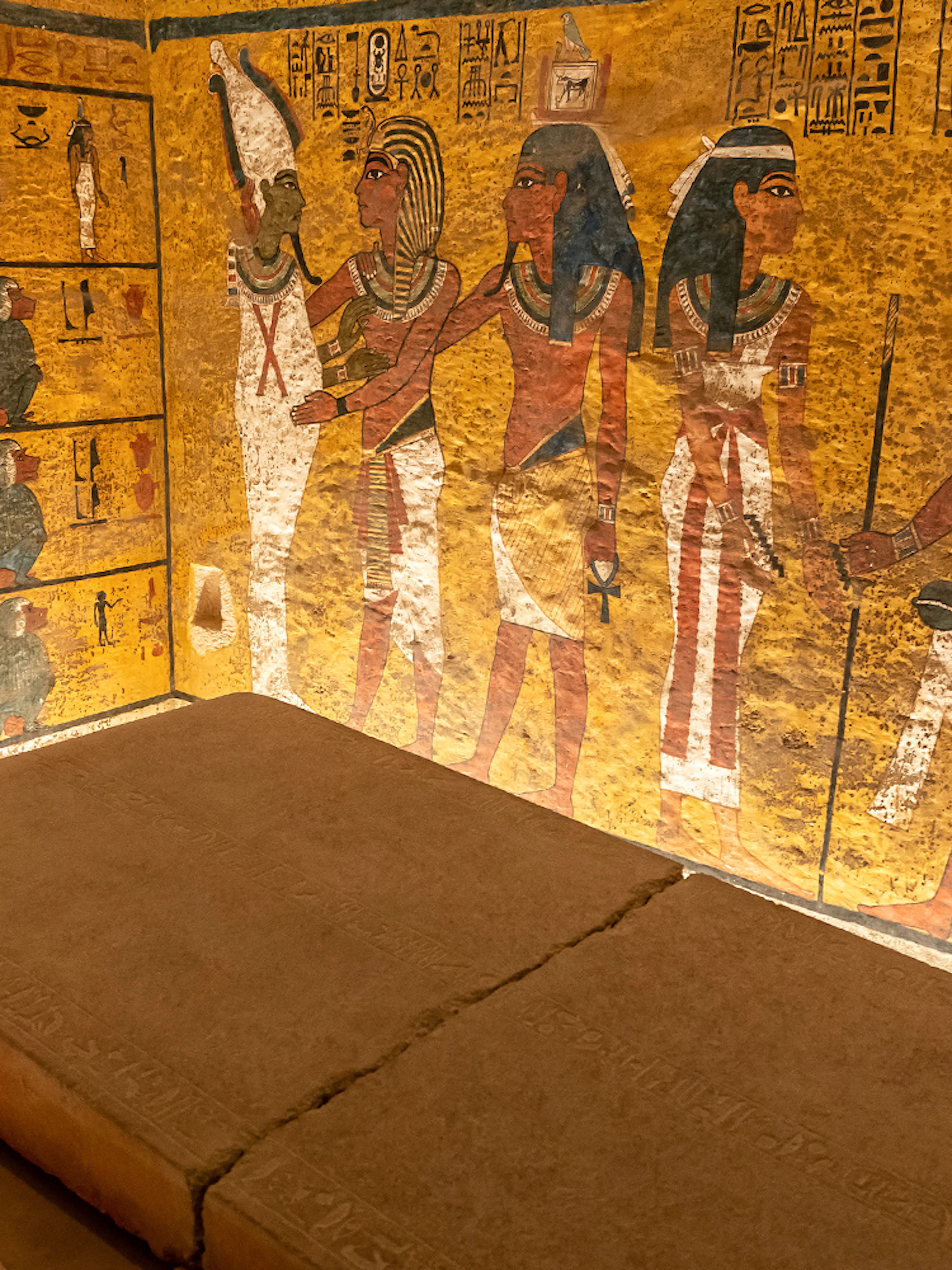 Tomb interior with ancient Egyptian wall paintings in the Valley of the Kings.