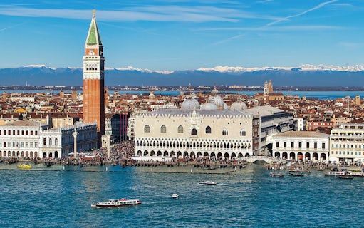 Doge's Palace aerial view with boats on the Grand Canal, Venice, Italy.