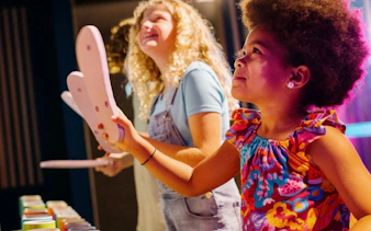 Children engaging with interactive exhibits at SparkLab, Queensland Museum.