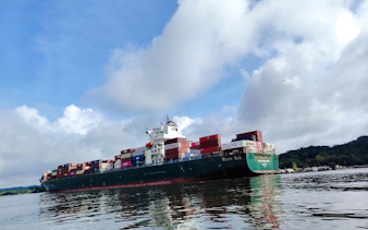Container ship on the Panama Canal near Monkey Island, Panama City.