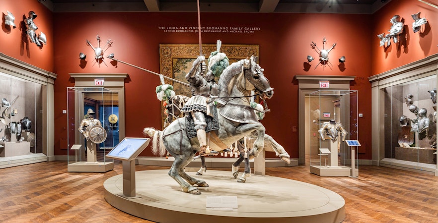 Mounted knight armor display at The Art Institute of Chicago's arms and weaponry gallery.