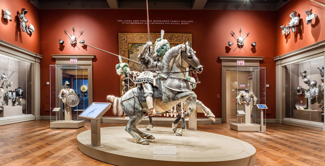 Mounted knight armor display at The Art Institute of Chicago's arms and weaponry gallery.
