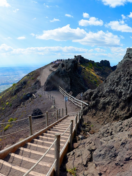 Walking trail leading to the summit of Mt Vesuvius with views of the Bay of Naples.