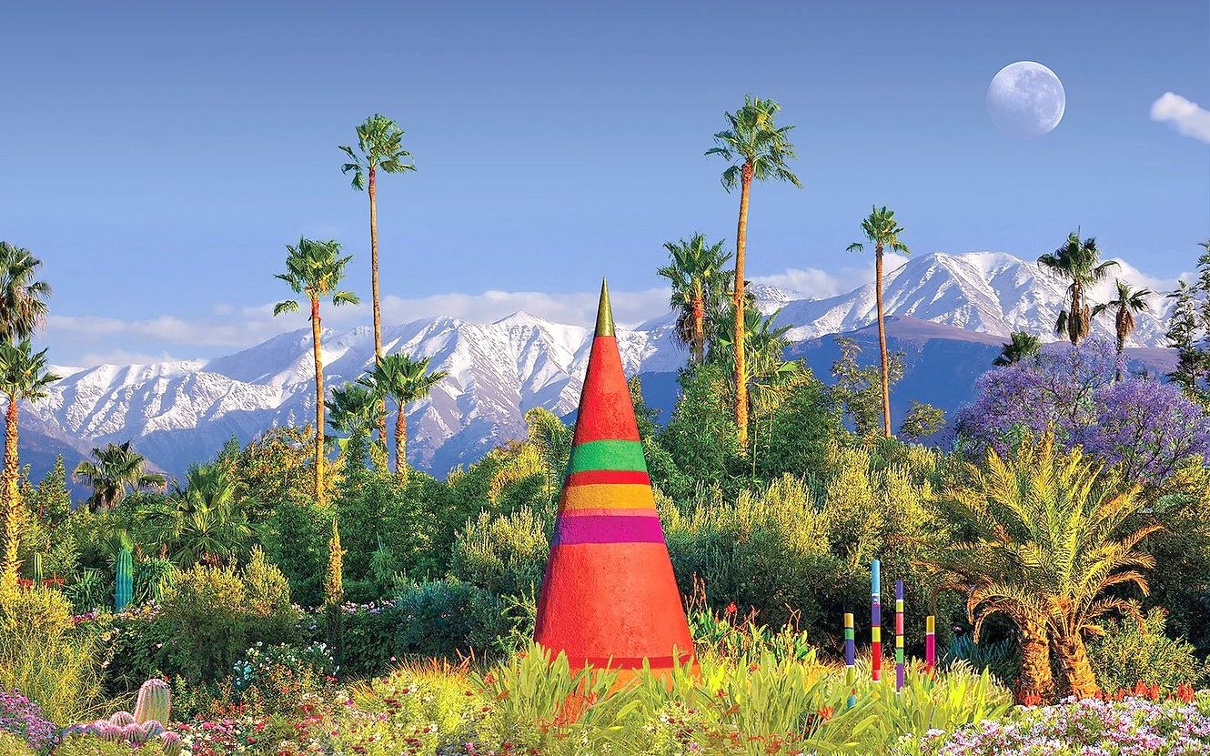 Colorful cone sculpture in ANIMA Garden with palm trees and Atlas Mountains in the background.