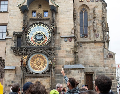 Guests viewing the Astronomical Clock tower in Prague.