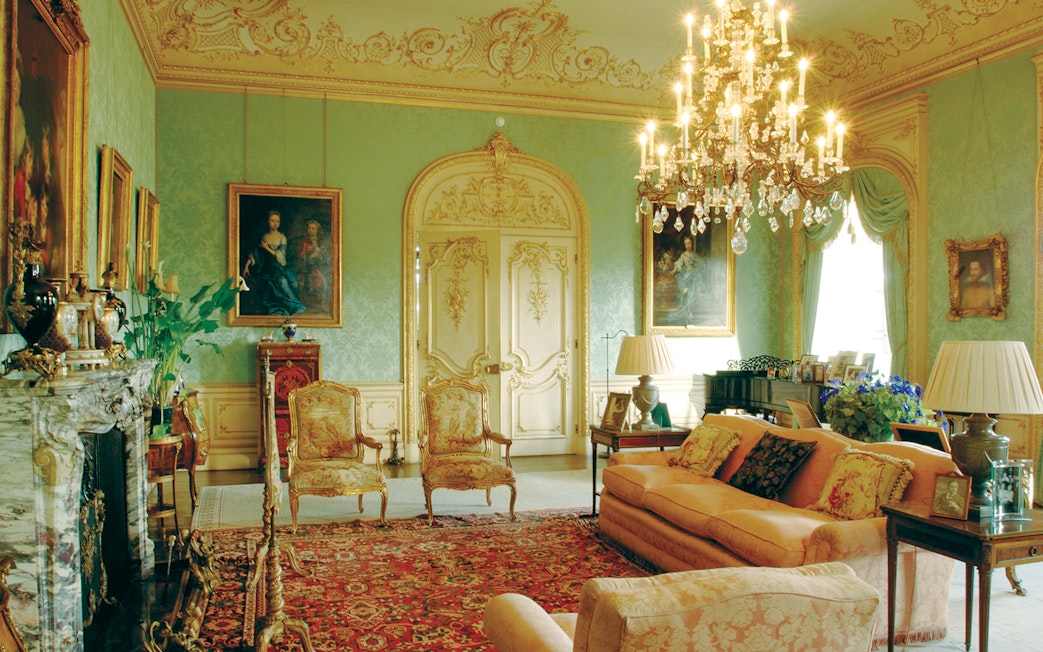 Highclere Castle drawing room with ornate decor and chandelier on Downton Abbey tour.