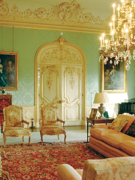 Highclere Castle drawing room with ornate decor and chandelier on Downton Abbey tour.