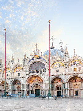 St. Mark's Basilica facade with ornate mosaics and domes, Venice, Italy.