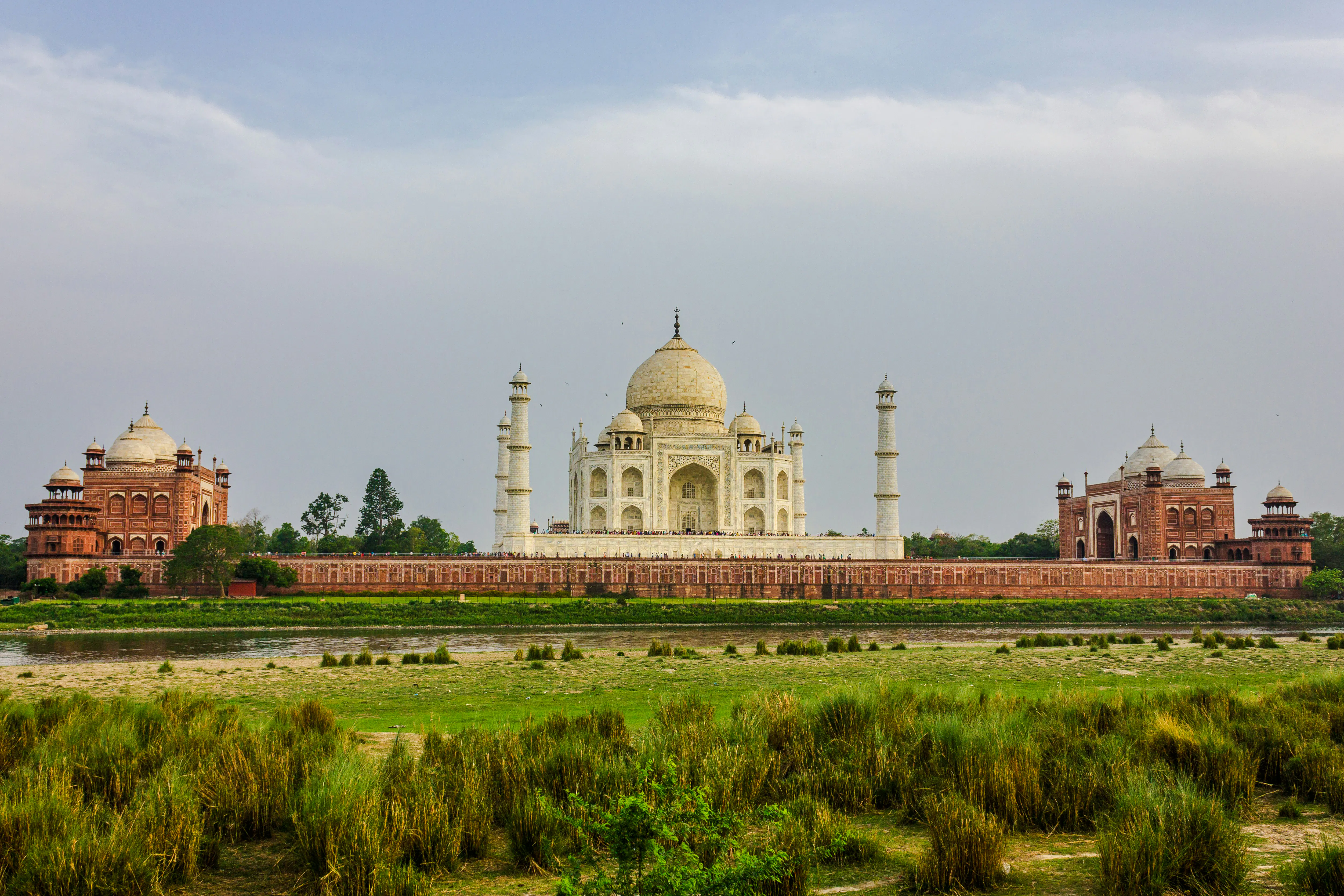 Taj Mahal view from Mehtab Bagh, Agra, highlighting the iconic mausoleum and surrounding gardens.