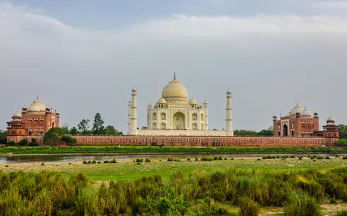 Taj Mahal view from Mehtab Bagh, Agra, highlighting the iconic mausoleum and surrounding gardens.