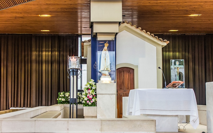 Chapel of the apparitions with statue of Mary in the Sanctuary of Fatima.