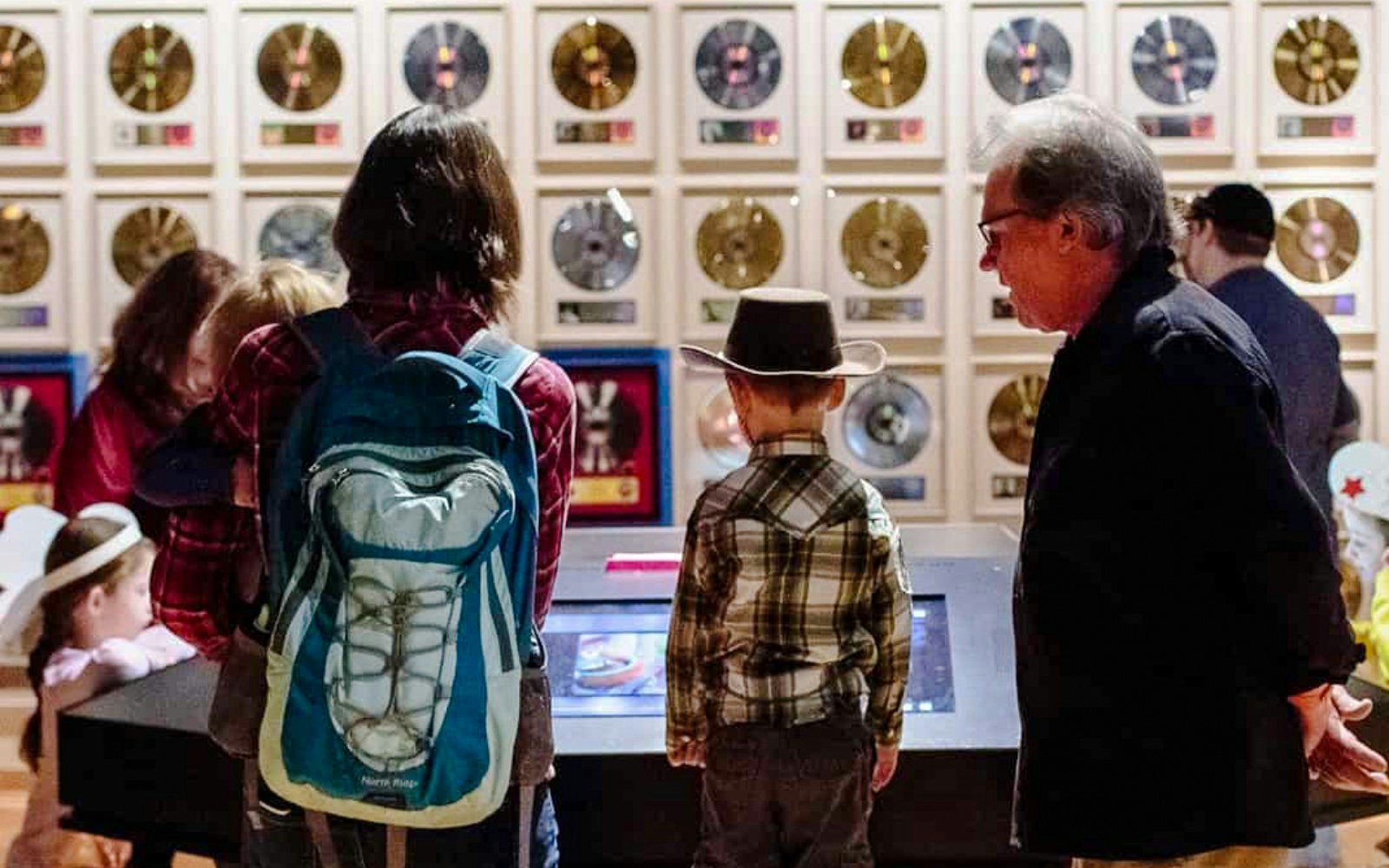 Visitors viewing exhibits at the Country Music Hall of Fame Museum.