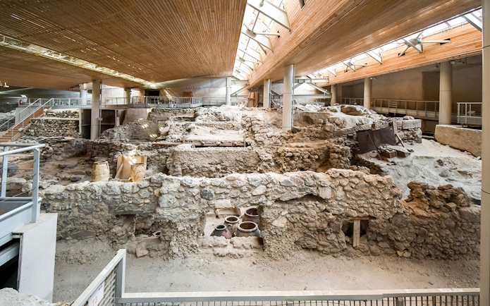Akrotiri Archaeological Site Museum interior showing ancient excavation ruins.