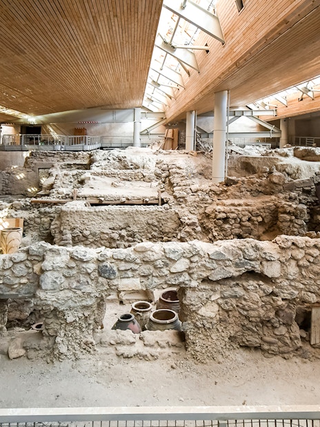 Akrotiri Archaeological Site Museum interior showing ancient excavation ruins.