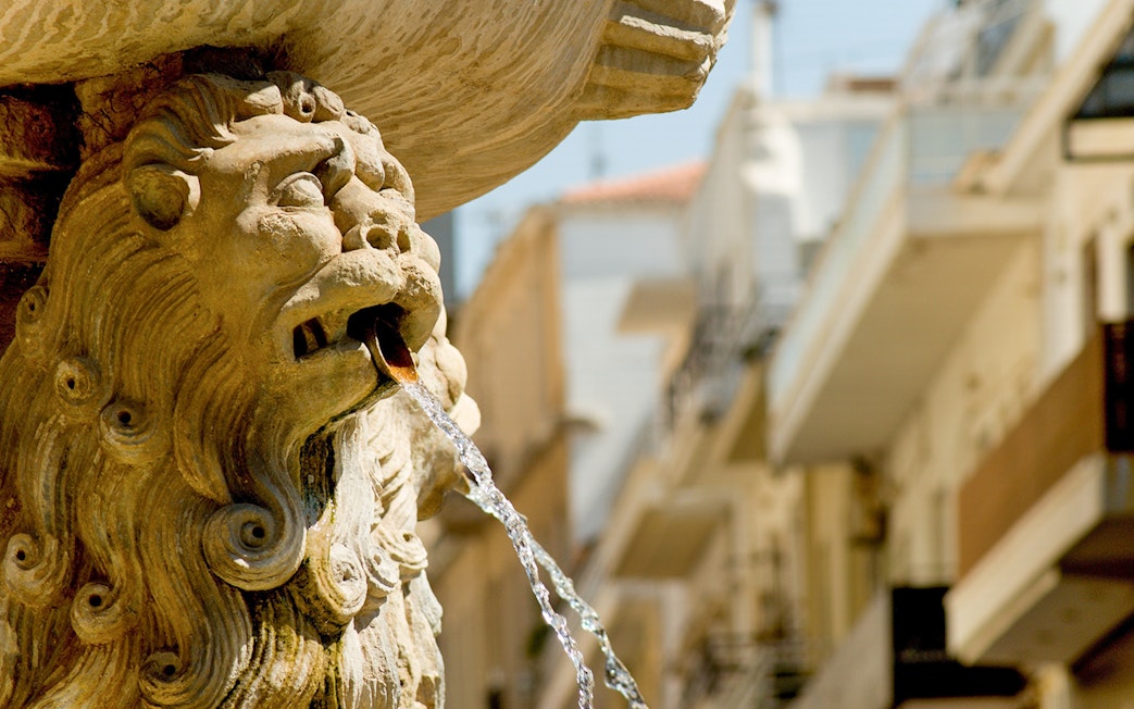 Lion fountain detail in Heraklion, Crete, on a sightseeing bus tour.