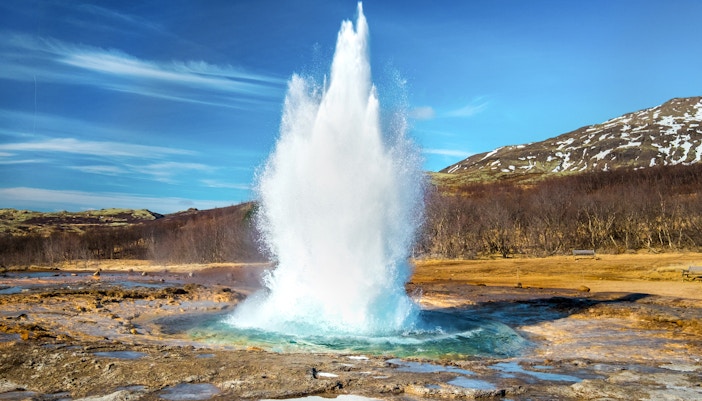 Geysir geothermal area with erupting hot spring in Golden Circle, Iceland.