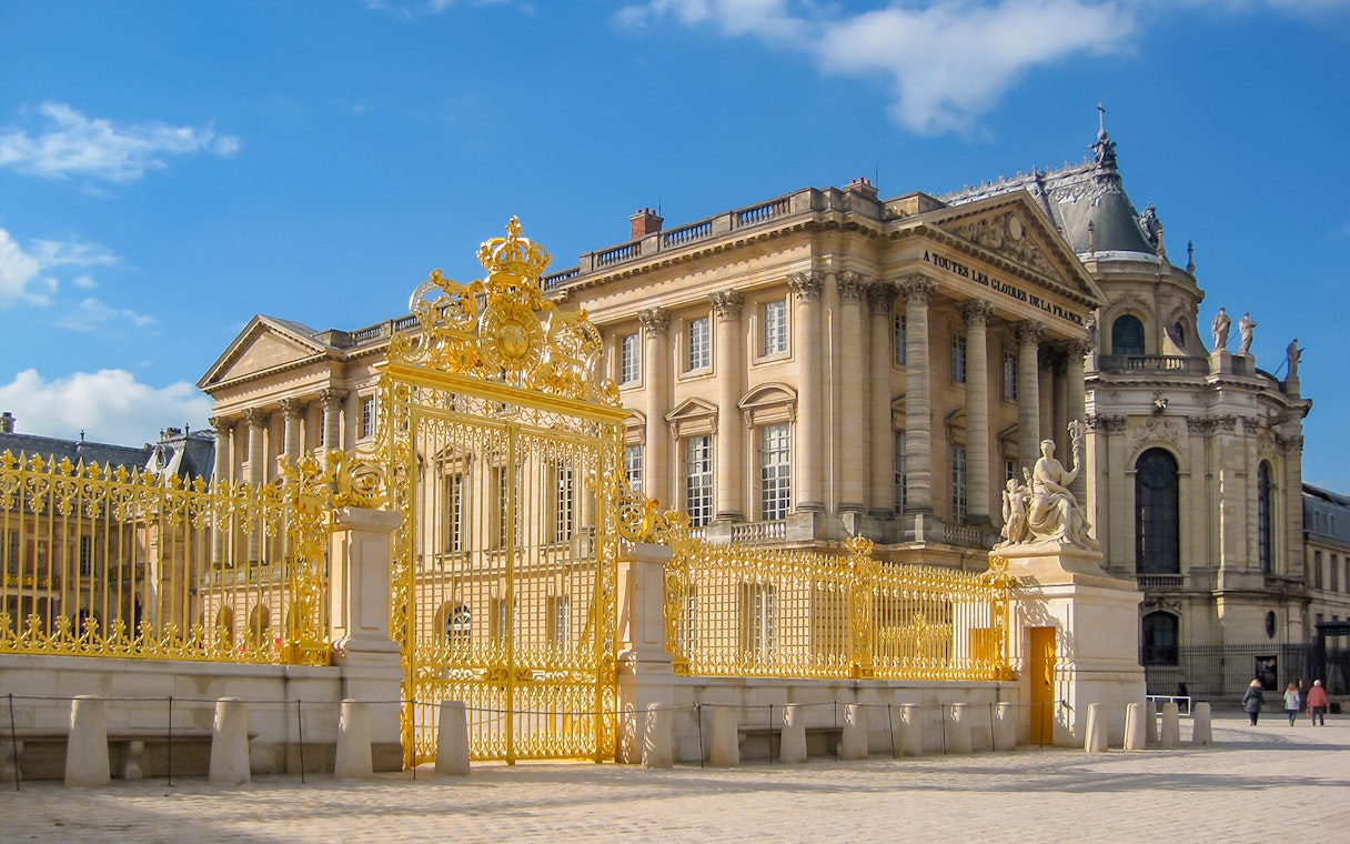 Golden gate entrance to Royal Chapel of Versailles Palace, Paris suburbs, France.