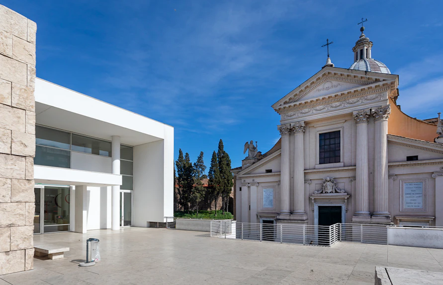 Ara Pacis Museum entrance and adjacent historic building in Rome.