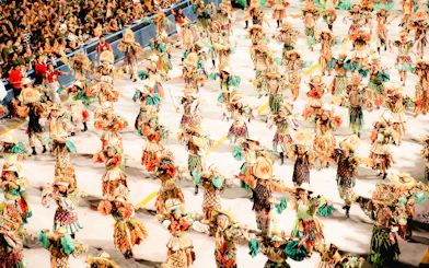 Samba dancers in colorful costumes performing at Rio Carnival parade, Rio de Janeiro.