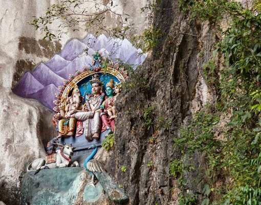 Colorful mural on a stone in Batu Cave in Malaysia, Hinduism temple