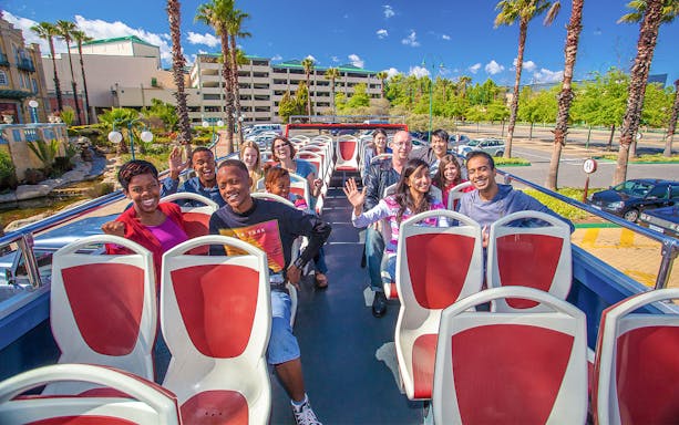 Passengers enjoying a hop-on hop-off bus tour in Johannesburg.