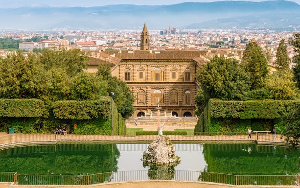 Palazzo Pitti and fountain viewed from Boboli Gardens, Florence.