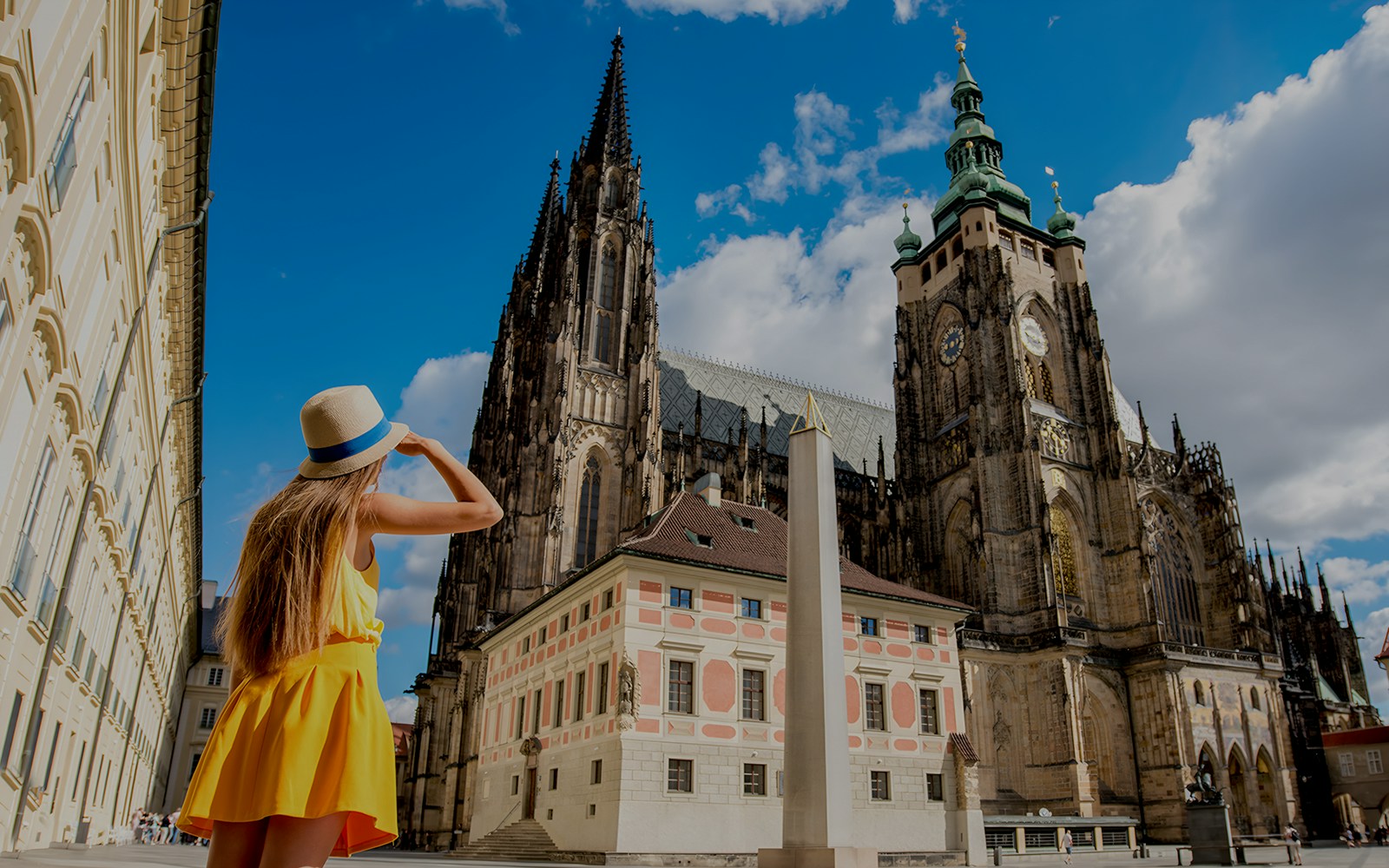 female tourist in front of Prague Castle