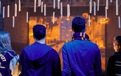 Friends exploring the Great Hall set at Harry Potter Studio Tour.