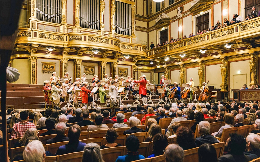 Mozart Orchestra performing in Vienna's Golden Hall at Musikverein.