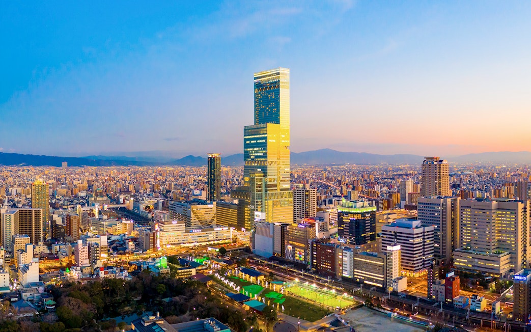 Osaka skyline at sunset with Abeno Harukas skyscraper, Japan.