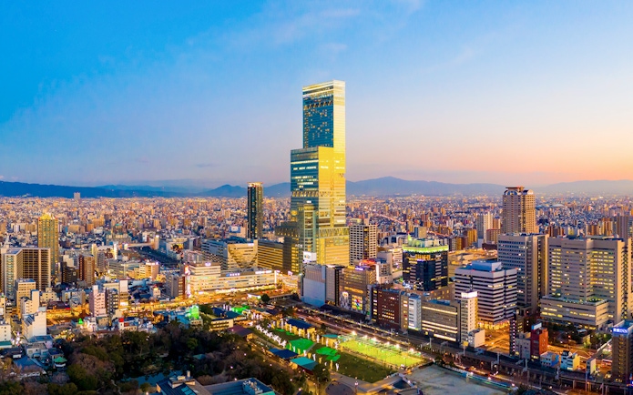 Osaka skyline at sunset with Abeno Harukas skyscraper, Japan.