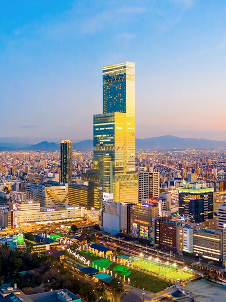 Osaka skyline at sunset with Abeno Harukas skyscraper, Japan.