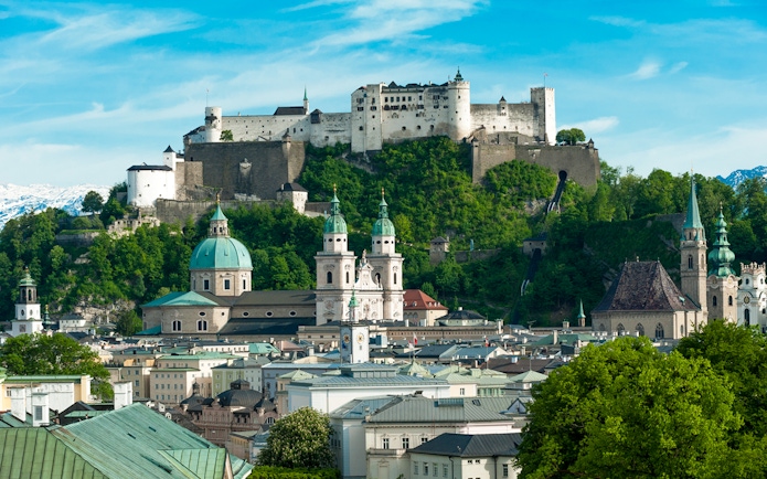 Fortress Hohensalzburg overlooking Salzburg cityscape, Austria.