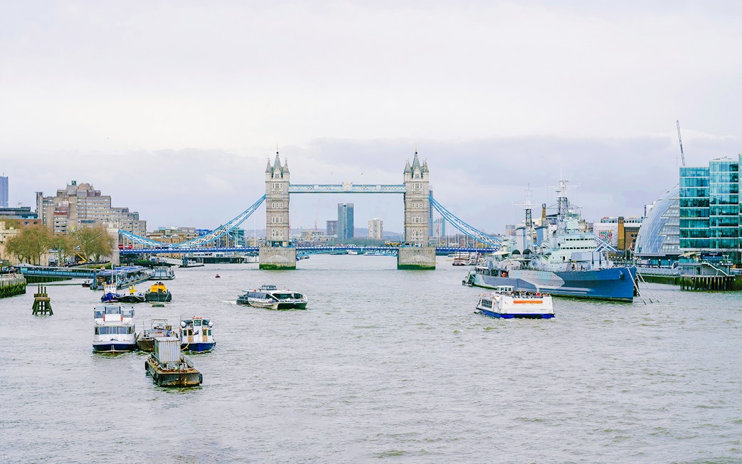 Cruises on the Thames River near Tower Bridge, London.