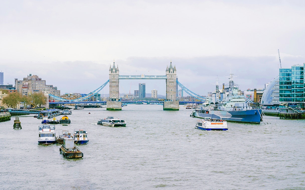Cruises on the Thames River near Tower Bridge, London.