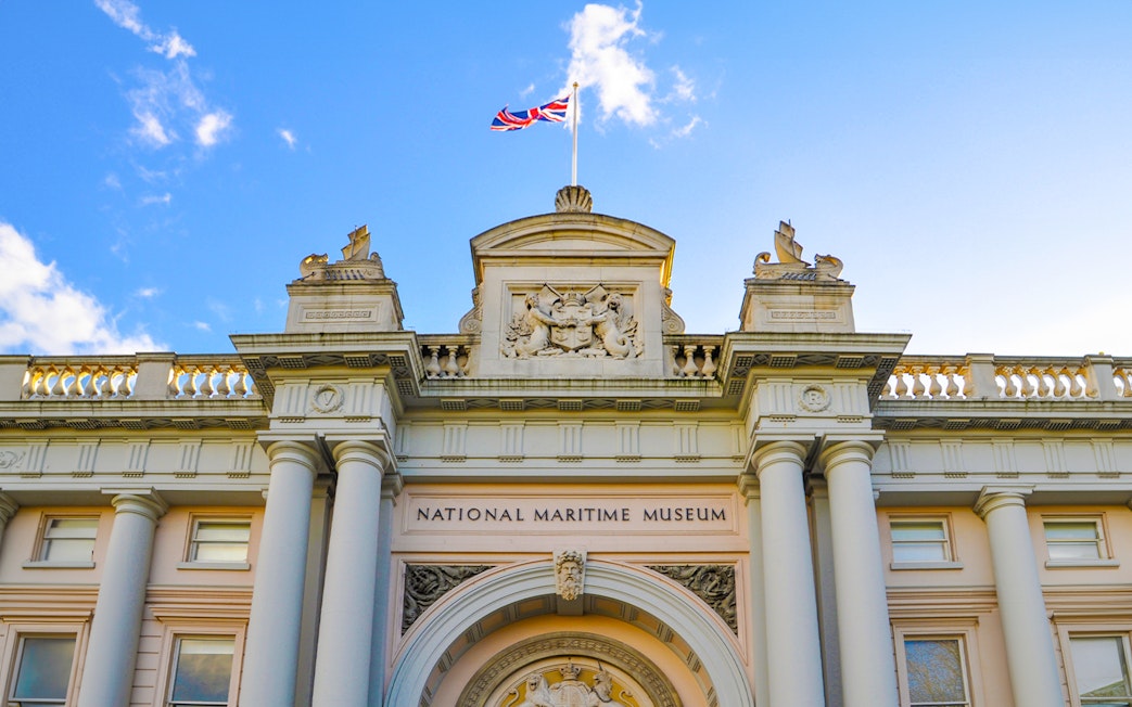 National Maritime Museum entrance with British flag, Greenwich.