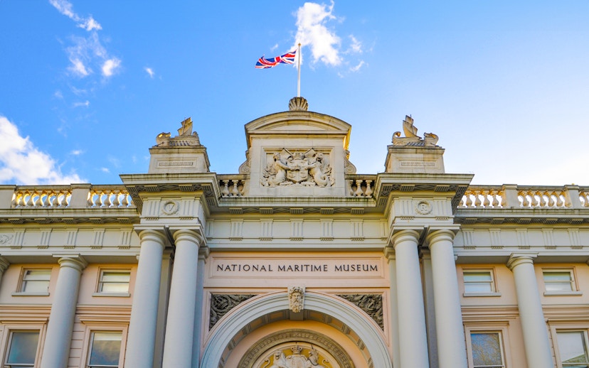 National Maritime Museum entrance with British flag, Greenwich.