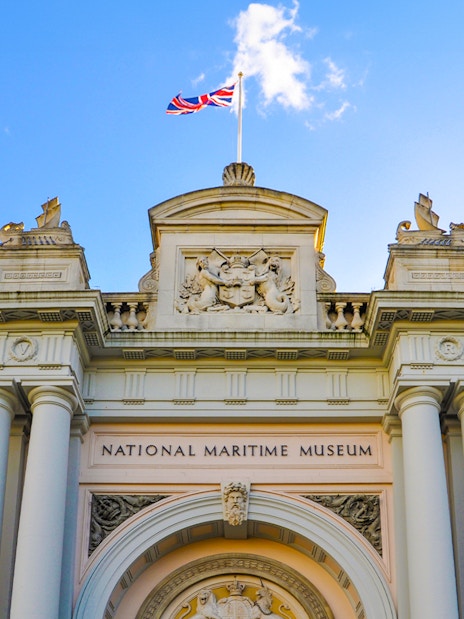 National Maritime Museum entrance with British flag, Greenwich.