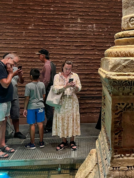 Visitors observing ancient columns at Basilica Cistern, Istanbul.