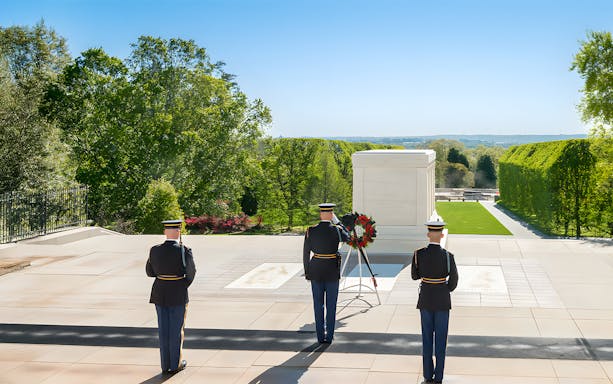 Three soldiers stand at the Tomb of the Unknown Soldier, Arlington National Cemetery, Washington, D.C.