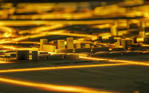 Illuminated cityscape model at Amsterdam in Motion exhibit.