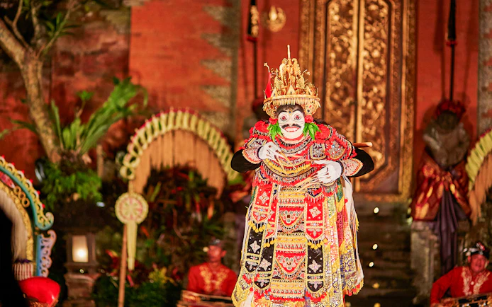Performer in traditional costume at Legong Dance Show, Ubud Palace, Bali.