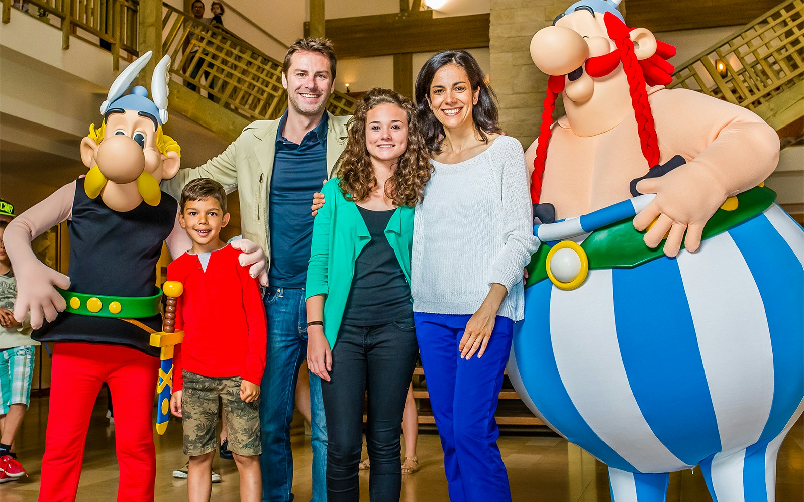 Visitors enjoying a roller coaster ride at Parc Asterix, France.