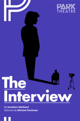 Two actors performing "The Interview" play on stage in a theater setting.
