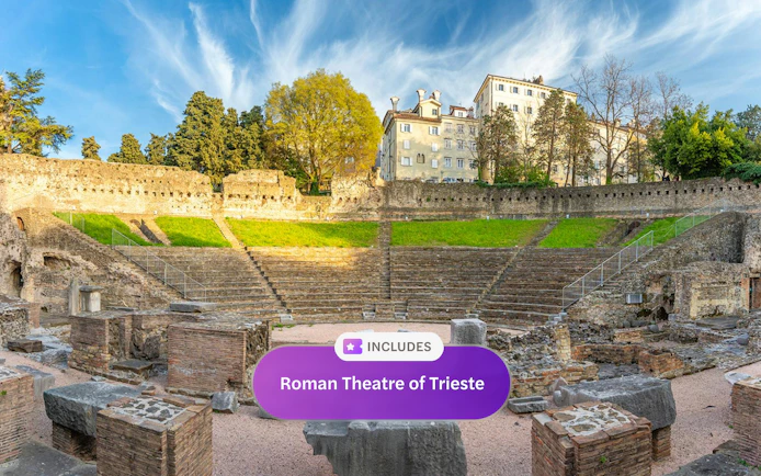 Roman Theatre of Trieste with ancient stone seating and surrounding greenery.