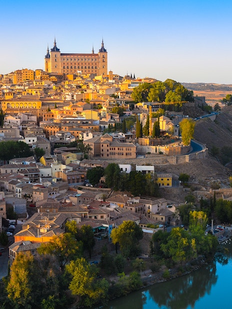 Toledo cityscape from Mirador del Valle with Alcázar and Tagus River.
