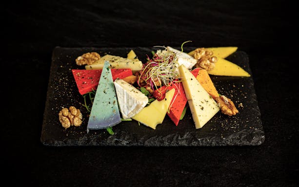 Assorted cheese platter with walnuts on a Budapest wine and dine cruise.