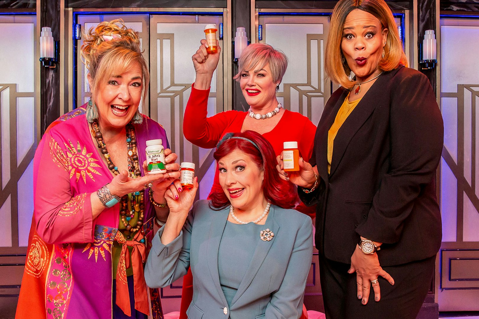 Women holding pill bottles in a scene from Menopause the Musical.