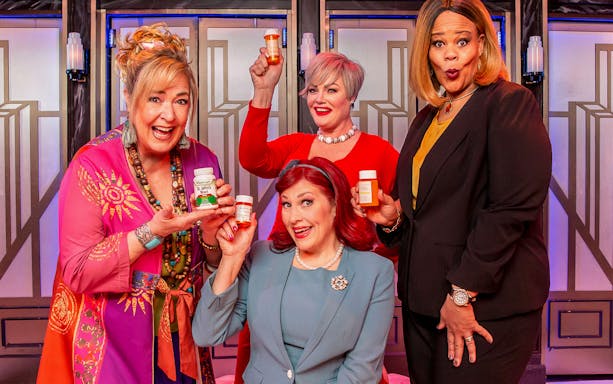Women holding pill bottles in a scene from Menopause the Musical.