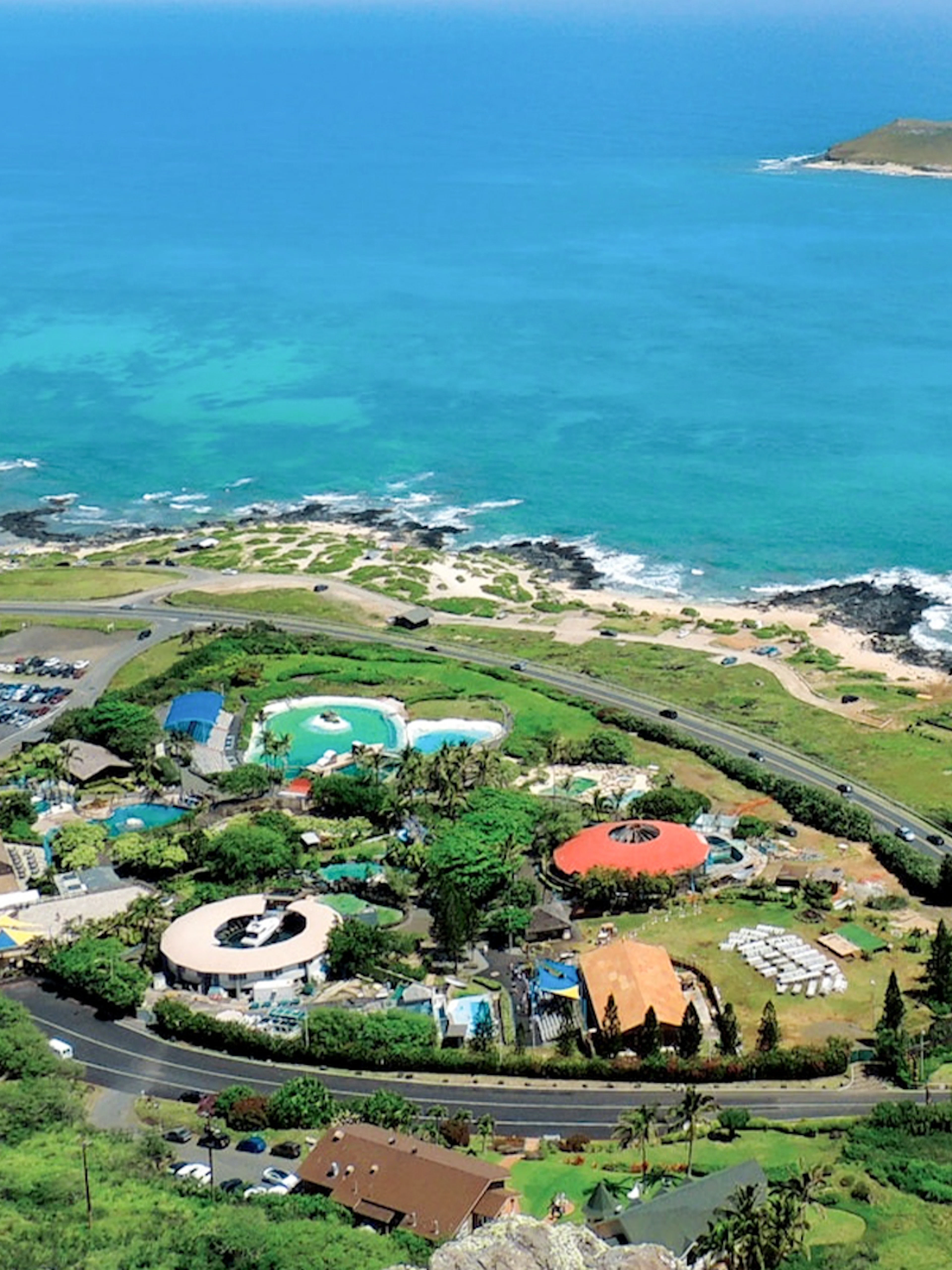 Aerial view of Sea Life Park Hawaii with ocean and island in the background.